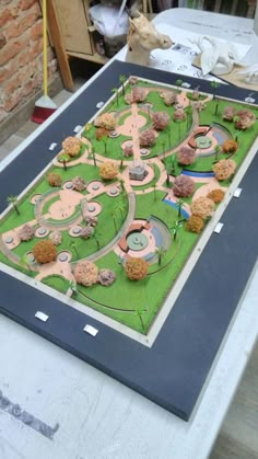 a model of a park is displayed on a table