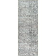 a gray rug with an overdyled design on the bottom, and a white background