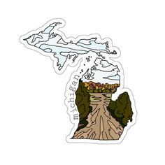 a sticker with an image of a road going through the woods and into the water