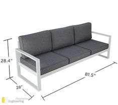 a white couch with gray cushions and measurements