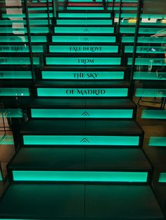 the stairs are lit up with green lights