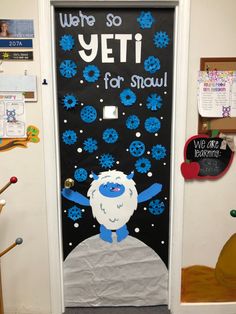 a door decorated with snowflakes and yeti for the new year's eve