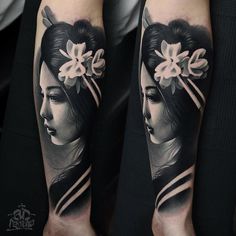 a woman with flowers on her head is shown in this black and white tattoo design