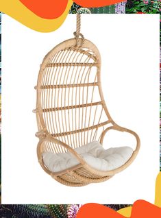 a rattan hanging chair with white cushions on an orange and yellow background is featured