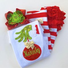 Grinch hand bodysuit or shirt for girls. Listing Includes: - Bodysuit, shirt OR ruffle shirt ADD the matching hairbow here https://www.darlinglittlebowshop.com/collections/easter/products/grinch-hairbow ADD the matching leggings here https://www.darlinglittlebowshop.com/products/peppermint-stripe-ruffle-leggings-red-and-white-striped-icings-ruffle-leggings-gorgeous-knit-ruffle-leggings-size-nb-to-10 Grinch Outfit, Grinch Birthday, Grinch Hand, Grinch Shirt, Grinch Hands, Grinch Shirts, Ruffle Leggings, Bodysuit Shirt, Body Suit With Shorts