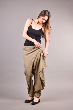 "Linen Harem Pants, Harem Trousers, Baggy Pants, Loose Pants. Extravagant harem trousers with interesting and unusual cut. The baggy pants are loose fit and feature drop crotch. The model is made of linen fabric so it is extremely comfortable women pants suitable for the daytime. If you are looking for the perfect addition to your casual outfit these loose pants are a great choice matched with flats or sneakers. ^ Sizes: The item can be made in sizes from XXS to 7XL. Please, use the size chart b Non-stretch Khaki Tapered Leg Pants, Baggy Khaki Ankle-length Pants, Khaki Baggy Ankle-length Pants, Versatile Harem Pants With Elastic Waistband, Versatile Khaki Pants, Versatile Khaki Trousers, Loosely Fitted Khaki Cargo Pants, Loosely Fitted Hips Khaki Cargo Pants, Stretch Khaki Cargo Trousers