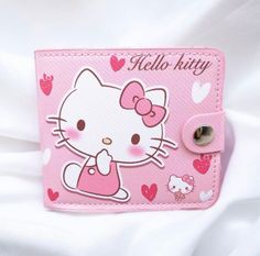 Add a touch of cuteness to your everyday style with Sanrio's Kawaii collection casual money bag! Featuring beloved characters like Hello Kitty, Cinnamoroll, My Melody, and Kuromi, this wallet is sure to delight fans of all ages. the wallet has dimensions of 11 cm by 9.5 cm. Crafted from high-quality polyester material, this money bag is durable and built to last. It's designed to securely hold your coins, cards, and cash, making it a practical accessory for everyday use. The easy-to-use buttons Pink Rectangular Kawaii Wallet, Cute Pink Coin Purse With Card Slots, Kawaii Pink Wallet, Cute Pink Wallets For Daily Use, Money Bag, Card Holder Wallet, Iconic Characters, Plush Toys, Everyday Fashion