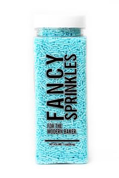 blue sprinkles in a jar with the words fancy on it's side