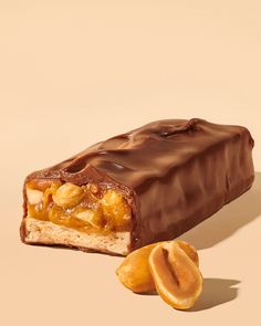 a chocolate bar with nuts on the side