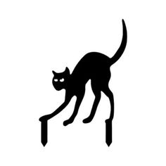 a black cat standing on top of a wooden post with an arrow in its mouth