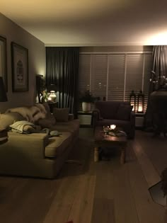 a living room filled with furniture and lights