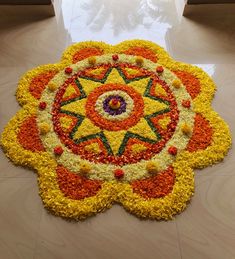 a colorful flower arrangement on the floor