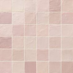 a white and pink tile wall that has been painted in pastel shades with different colors