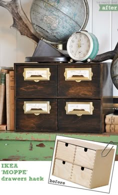 there is a wooden drawer with four drawers and two globes on the shelf next to it