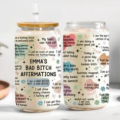 two glass jars with words written on them