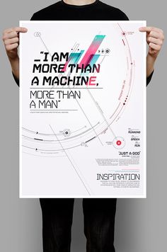 a man holding up a poster with the words i am more than a machine