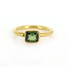 1.18 Carat Green Tourmaline Ring 18k Solid Yellow Gold Ring Emerald cut Tourmaline Ring Green Stone Ring, Bezel Set Ring Product Details > Gemstone - Natural Green Tourmaline > Materials - 18K Solid Yellow Gold > Gemstone Shape - Emerald cut > Ring Size - all size available > Gemstone weight - 1.18 carats Approx > Gross Weight - 3.092 grams approx > Setting type - bezel setting # Ring size - all sizes are available, you can update about your ring size to us at the time of purchase. *Production T Yellow Gold Tourmaline Emerald-cut Ring, Tourmaline Birthstone Ring In Yellow Gold, Yellow Gold Tourmaline Birthstone Ring, Emerald Cut Tourmaline Gemstone Rings, Gold Tourmaline Ring For May Birthstone, Formal Tourmaline Rings For May Birthstone, Formal Yellow Gold Emerald Ring, Formal Tourmaline Rings With Bezel Setting, Formal Tourmaline Ring With Bezel Setting