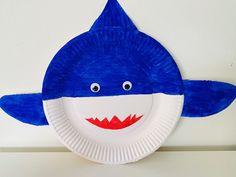 a paper plate shaped like a shark