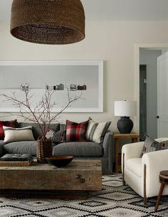 a living room filled with furniture and decor