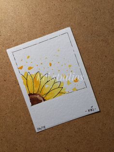 a piece of paper that has some yellow flowers on it