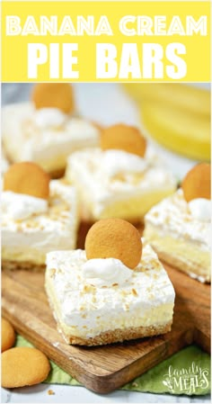 banana cream pie bars with marshmallow toppings on a cutting board and bananas in the background