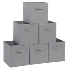 six grey storage bins stacked on top of each other