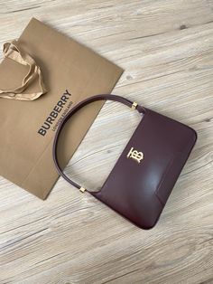 A structured shoulder bag in smooth leather, accented with our Thomas Burberry Monogram. The versatile design features an adjustable shoulder strap. 28 x 5 x 14cm/11 x 2 x 5.5in Min. shoulder strap drop: 19.5cm/7.7in Max. shoulder strap drop: 35.5cm/14in Outer: 100% calf leather Trim: 100% calf leather Lining: 100% lambskin Adjustable shoulder strap Four interior card slots One interior slip pocket Zip closure Hand-painted edges Polished metal hardware Made in Italy Shein Back To School, Shein Back To School Outfits, Burberry Her, How To Become Pretty, Burberry Outfit, Burberry London, Attractive People, Painting Edges, Burberry Bag