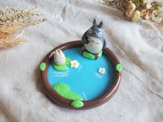 a cake in the shape of a hippo pond