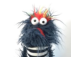 a close up of a stuffed animal on a white background