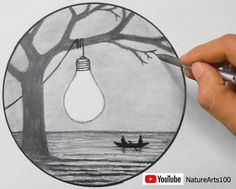 someone is drawing a tree with a light bulb hanging from it's center point