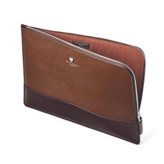 City Leather Folio Case in Tobacco Pebble Luxury Classic Wallet In Saffiano Leather, Luxury Cognac Briefcase With Luggage Sleeve, Classic Leather Case With Laptop Sleeve, Luxury Laptop Bag With Leather Trim, Classic Formal Briefcase With Leather Trim, Luxury Brown Laptop Bag With Luggage Sleeve, Luxury Cognac Laptop Bag For Office, Elegant Cognac Laptop Bag For Formal Occasions, Brown Leather Trim Briefcase For Office