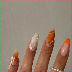 a woman's hand with different nail designs on it