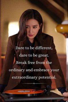 a woman sitting at a table with a record in her lap and the words dare to be different, dare to be great break free from the ordinary