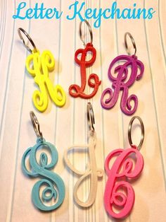 the letter keychains are all different colors and styles, but one is for each child's name