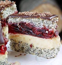 two pictures of different desserts on a white plate with chocolate and raspberry filling