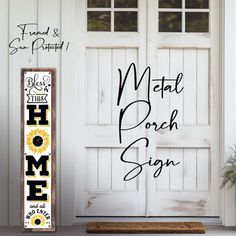 a sign that says metal porch sign next to a white door with sunflowers