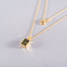 Introducing our exquisite Rectangle Peridot Necklace, a stunning piece crafted from high-quality 14K solid gold. This elegant necklace features a striking peridot gemstone, which is the birthstone for August, and is beautifully set in a refined rectangular design. Its vibrant green hue captures the essence of nature, making it a perfect addition to any jewelry collection. This delightful Rectangle Peridot Necklace is ideal for various occasions, whether it's for a casual day out or a more formal Baguette Pendant, Timeless Christmas, Peridot Bracelet, Peridot Jewelry, Peridot Necklace, Necklace Elegant, Peridot Stone, August Birthstone, Christmas Gift For Her