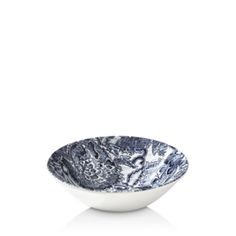 a blue and white bowl on a white background