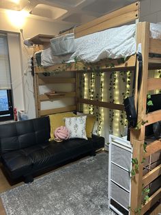 a living room with a couch and bunk bed