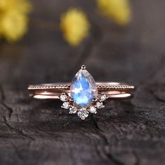 https://bbbgem.com/product/solitaire-rainbow-pear-moonstone-diamond-engagement-ring-set/?ref=iykwuu3z1v #engagementring #anniversarygift #solitaire Black Opal Engagement Ring, Rainbow Moonstone Engagement Ring, Moonstone Engagement Ring Rose Gold, Opal Engagement Ring Set, Moonstone Engagement Ring Set, Vintage Gold Engagement Rings, Antique Engagement Ring, Moonstone Engagement, Moonstone Engagement Ring