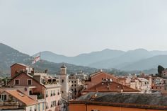 a city with mountains in the background