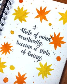 a notepad with an orange and yellow leaf design on it that says state of mind eventually become a state of being