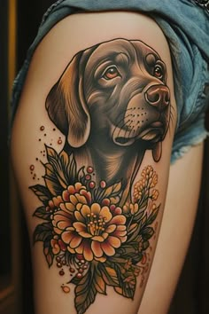 a woman's thigh with a dog and flowers on it