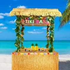 a tiki bar set up on the beach