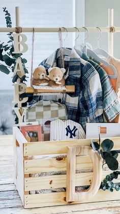 a wooden crate filled with stuffed animals and other items