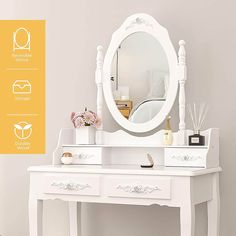 a white dressing table with a mirror on it