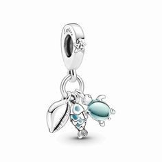 Go on a snorkeling adventure and meet the beautiful creatures of the dreamy deep blue sea with this ocean-themed triple dangle charm. This trio of sterling silver dangle charms includes a conch shell, a scaled fish with turquoise enamel detailing and a sea turtle with two-toned blue and green Murano glass as its shell. The bail features a tiny raised starfish and the messages "Explore" and "Dream", reminding you to seek your next adventure, wherever that might be. Ocean-inspired Jewelry With Dangling Charms For Gifts, Ocean-inspired Silver Charms Jewelry, Ocean-inspired Starfish Dangle Jewelry, Ocean-inspired Dangle Charms Jewelry, Ocean-inspired Turquoise Dangle Jewelry, Turquoise Dangle Earrings With Ocean-inspired Style, Turquoise Dangle Earrings Ocean-inspired, Diy Jewelry Gifts, Charms Pandora