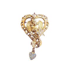 "Vintage Signed Kirks Folly Dangle Heart Brooch (A1935) Size: 2\". Color: Gold Condition: Very good vintage Signed: Kirks Folly Details: Beautiful and attractive. Please look at all the photos, as they are part of the description. I try my best to point out any flaws. Also please remember this is a preloved piece and may show signs of light wear, marks, scratches, etc. I will be posting a lot more jewelry, Keep checking back." Vintage Wedding Brooches For Valentine's Day, Vintage Gold Heart Brooches, Vintage Heart-shaped Wedding Brooches, Vintage Heart-shaped Brooch Jewelry, Vintage Heart Shaped Brooch Jewelry, Vintage Heart Shaped Brooch, Vintage Brooch Jewelry For Valentine's Day, Vintage Brooch For Valentine's Day, Vintage Valentine's Day Jewelry Brooch