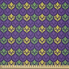 a purple background with green and yellow florets on it, as well as a ruler