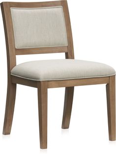 a wooden chair with a beige upholstered seat and back cushion on an isolated white background